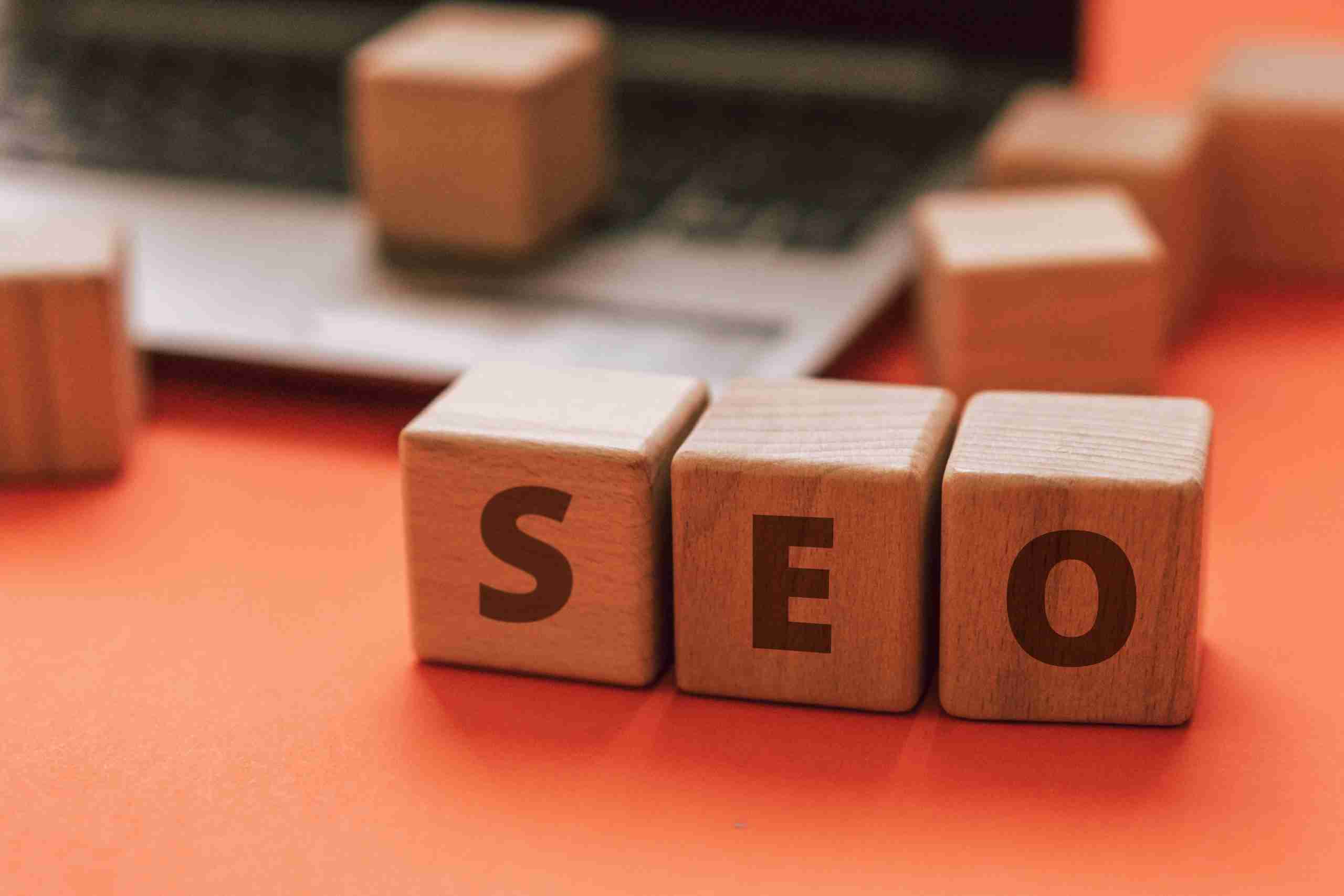photo of blocks on desk that spell the word SEO